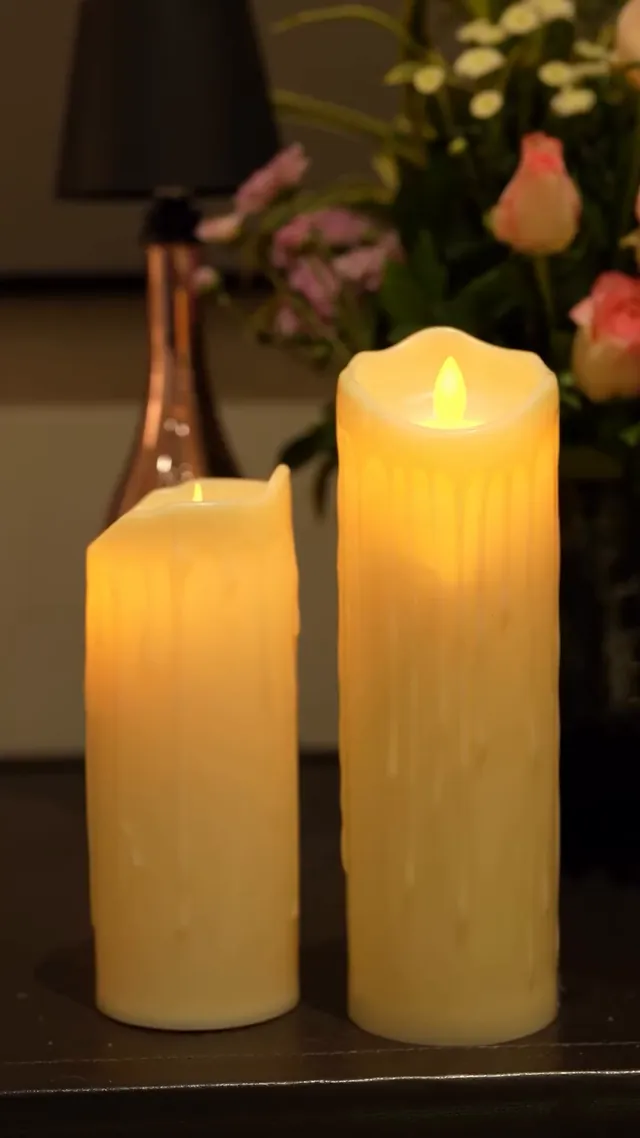 Pillar candles with pink roses