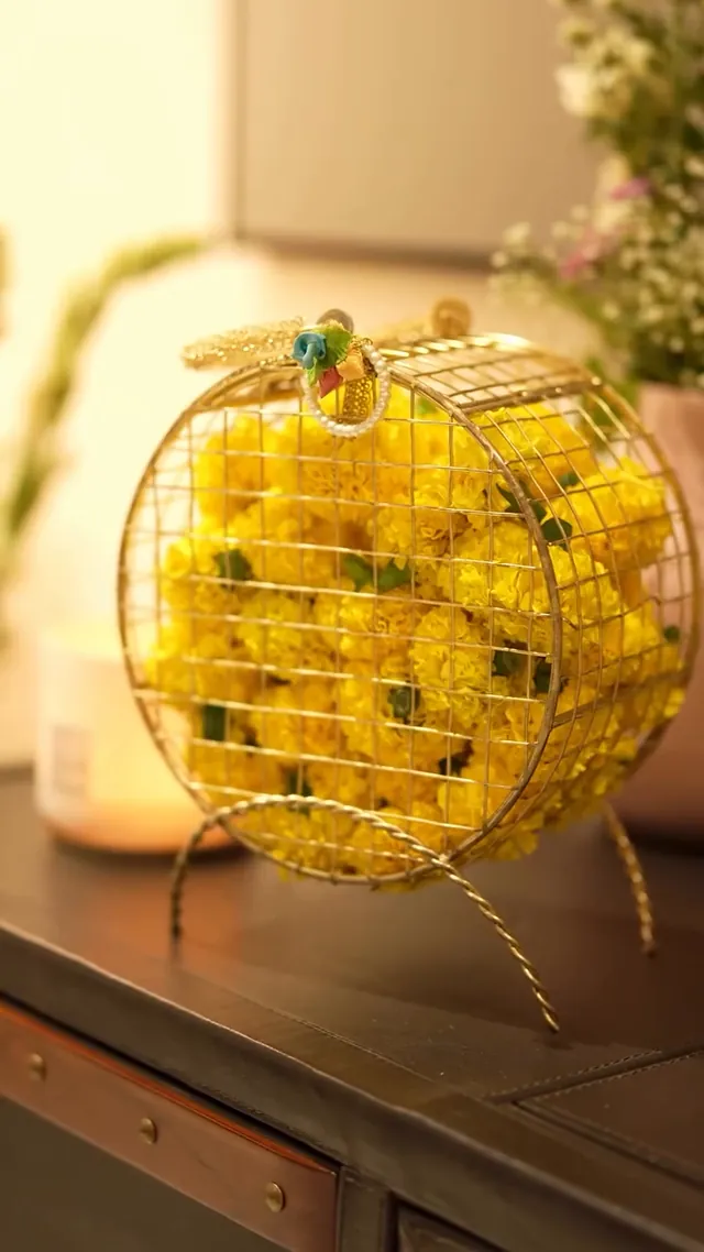 Marigold ball in a gold cage
