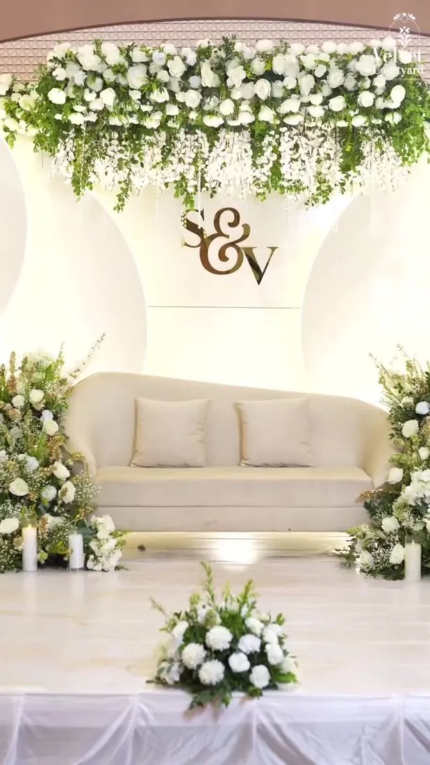 All-white floral wedding stage